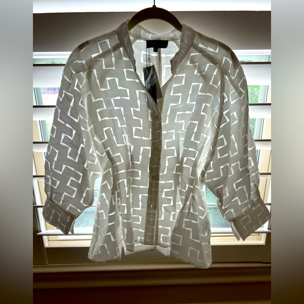 Gracia Fitted Peplum Top size small.